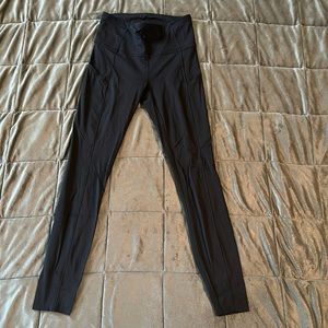 Black lululemon leggings with pockets. Size 4.